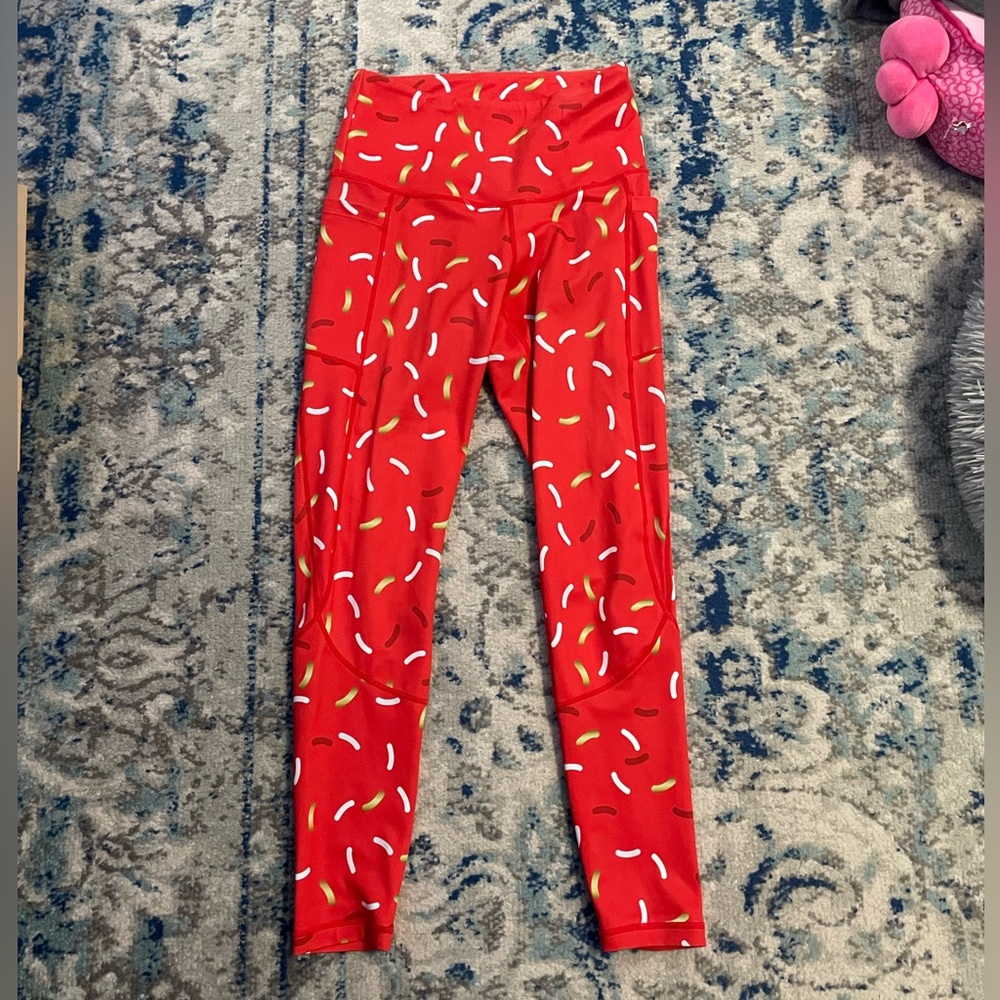 Feed me Fight me red donut sprinkle leggings